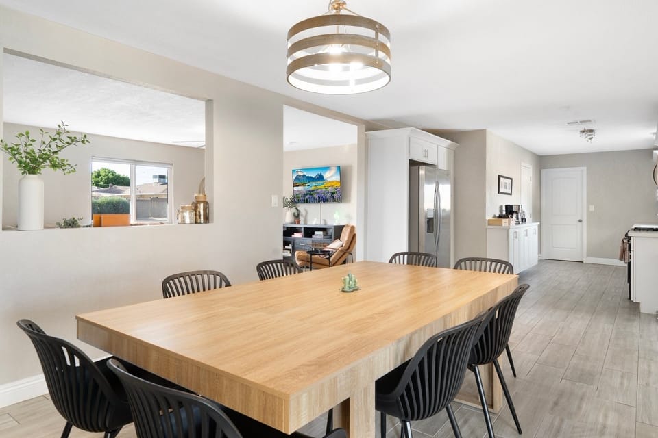 Open dining area seamlessly connecting to the living room and kitchen.