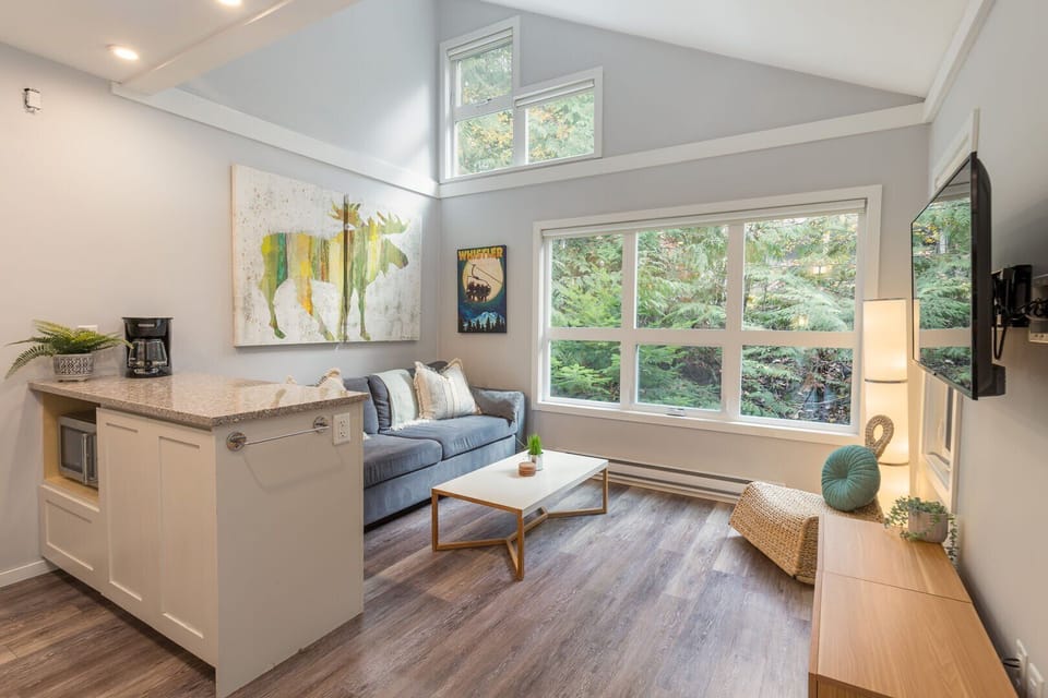 Relax in the cozy living room with a comfy double sofa bed.