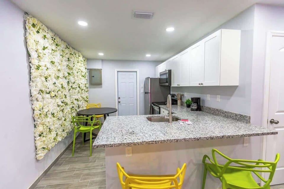 Enjoy meals in the kitchen; bright & airy with modern amenities.