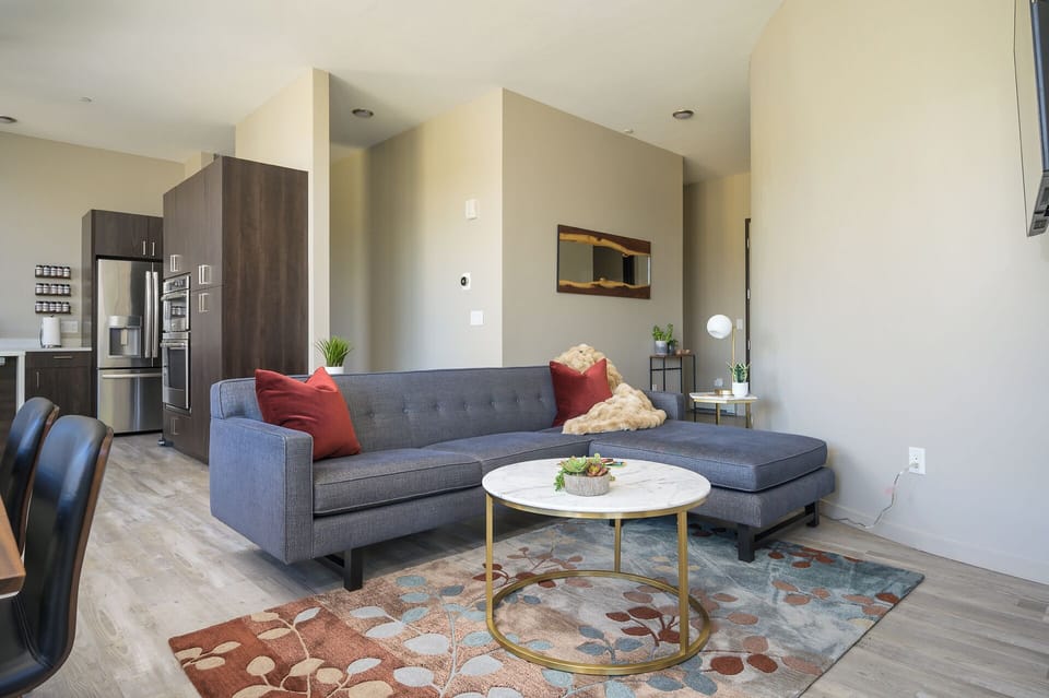 Enjoy the open living room that flows into the kitchen