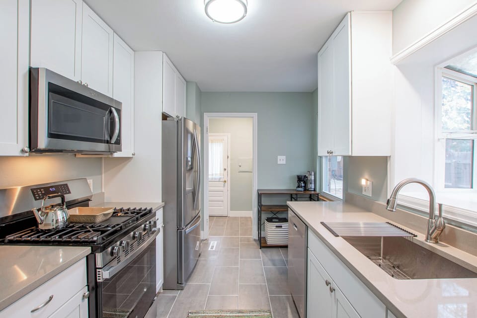 Kitchen pic from dining with laundry in the back.