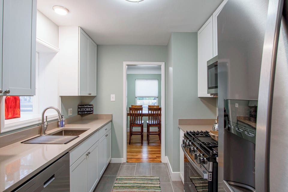 Fully stocked kitchen with new everything! You can see dining in the back. 