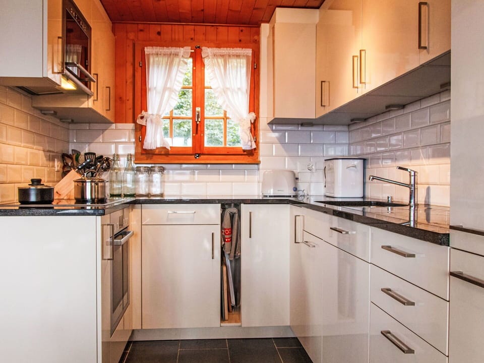 Cabinetry, Countertop, Property, Building, Kitchen, Kitchen Stove, Wood, Window, Interior Design, Kitchen Appliance