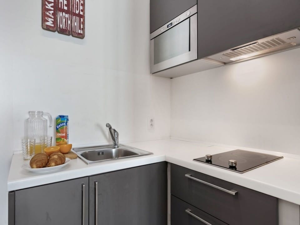 Kitchen, Kitchen Appliance, Countertop, Major Appliance, Cabinetry, Interior Design, Kitchen Stove, Kitchen Sink, Furniture, Home Appliance