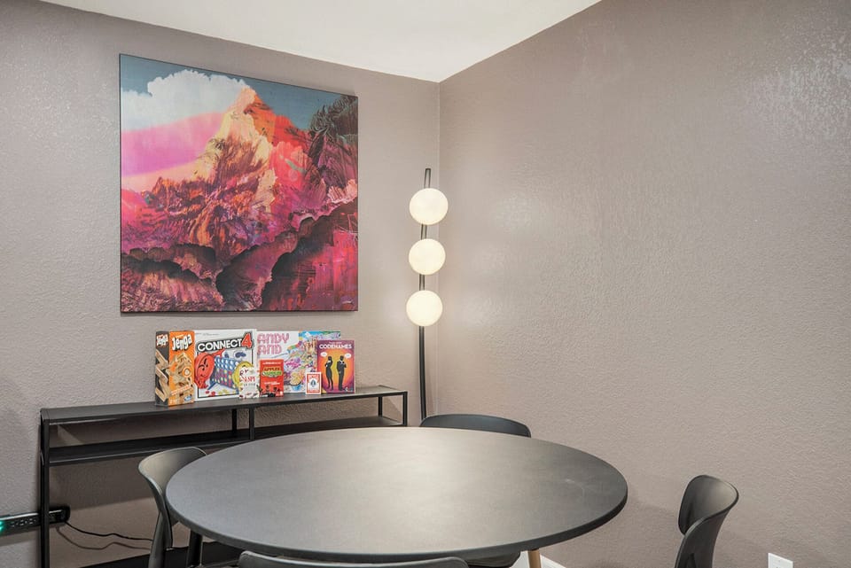 Enjoy a fun-filled game night at the game table, complete with a selection of provided board games for endless entertainment!