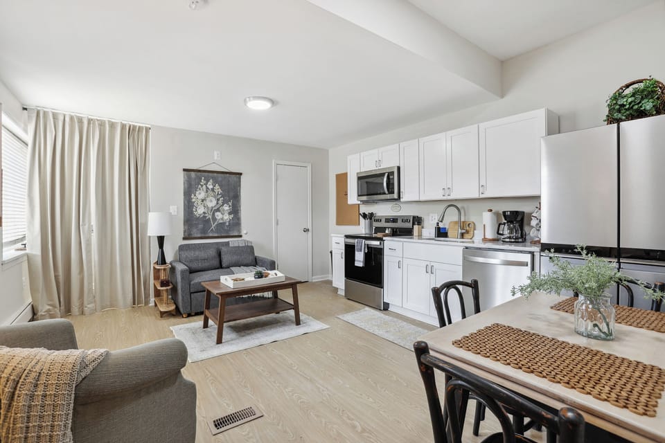 Living space with plush sofa, perfect for relaxing after exploring downtown