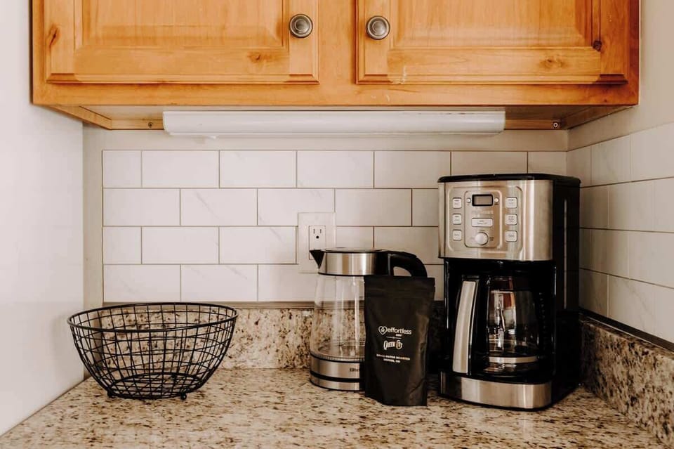 Coffee maker with coffee provided