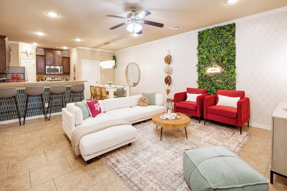 Living room with plush seating in an open floor plan concept