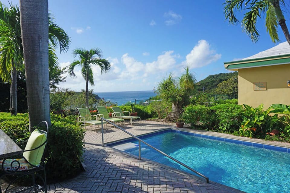 Your view to the south from Tennis Villa looks out over Chocolate Hole Harbor