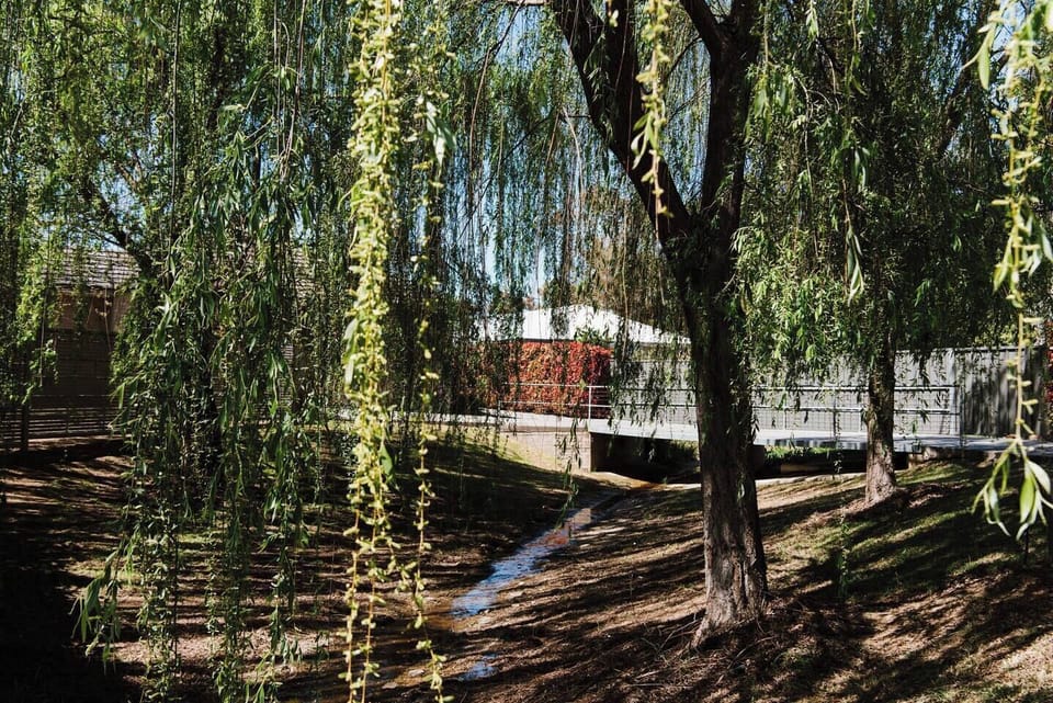 This home is securely fenced and graced with willow trees offering an idyllic country retreat.