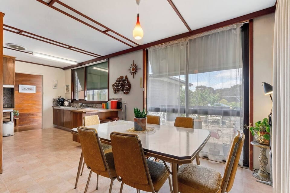 Having meals indoors is a breeze with a carpeted dining setting for six