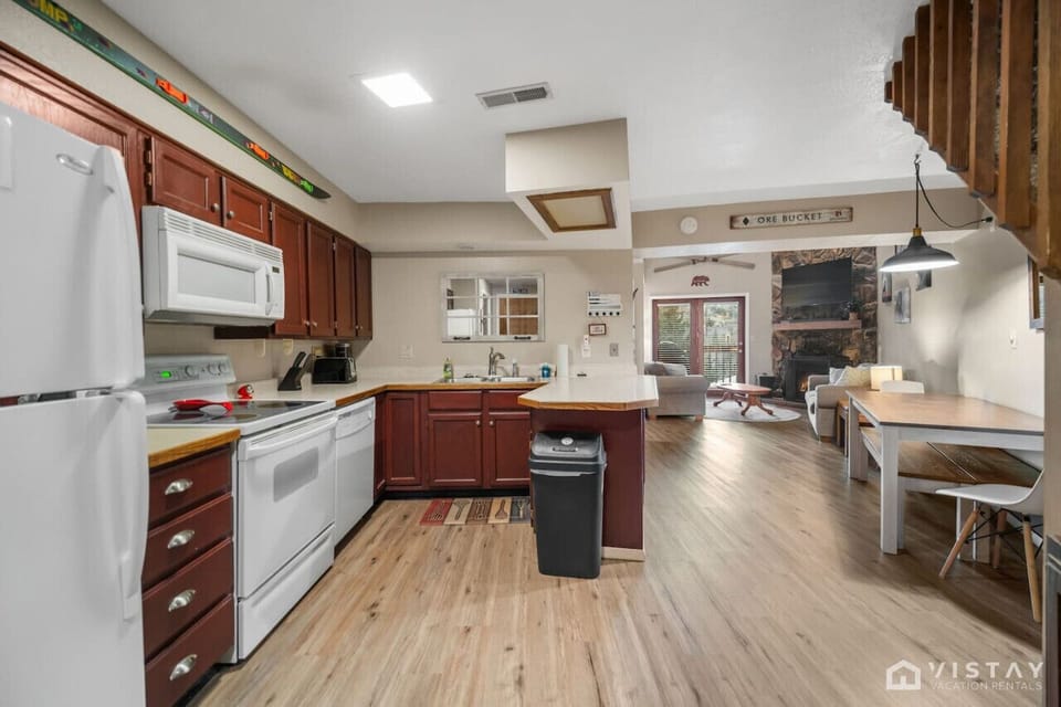 The fully equipped kitchen offers everything you need to prepare your favorite meals, including a Drip coffee maker and Keurig for your morning brew, a waffle maker for delicious breakfasts, and a griddle for easy cooking.