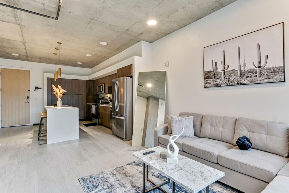 Bright open-concept design combining kitchen, dining, and living space with stylish details and plenty of room to gather 🍷🛋️✨