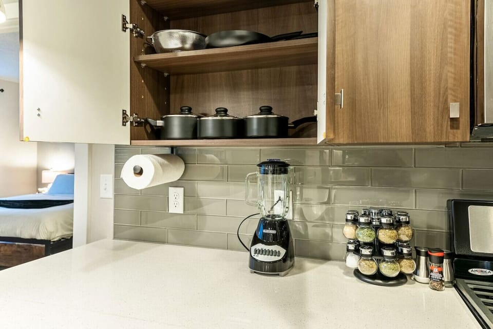 Kitchen counter setup w/ coffee station & essentials neatly organized for easy mornings