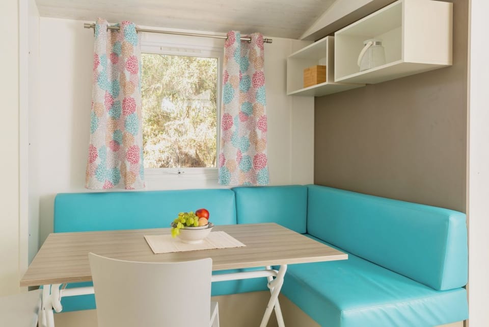 Nice and welcoming mobile home located near the beach with air conditioning of approximately 32 m2 composed of a living room, kitchenette with gas stove, fridge with freezer, pots and pans.A bedroom with a double bed and two other bedrooms with two singl Campground/ 
RV Resort in Lazio
