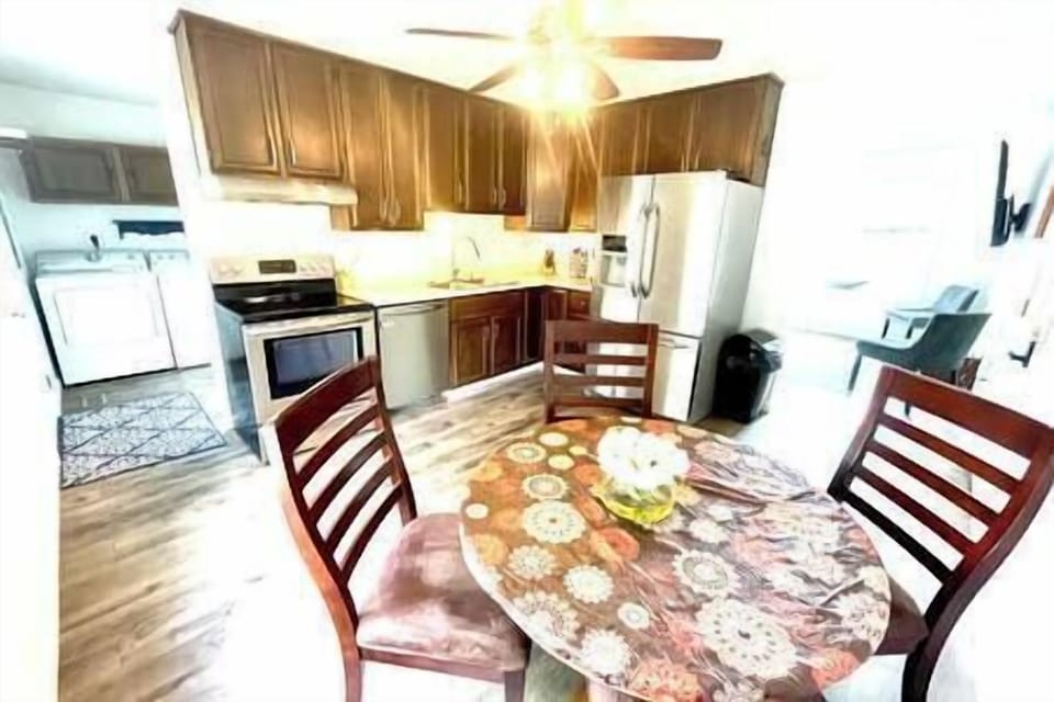 Full kitchen with fridge, oven, coffee machine and dishwasher