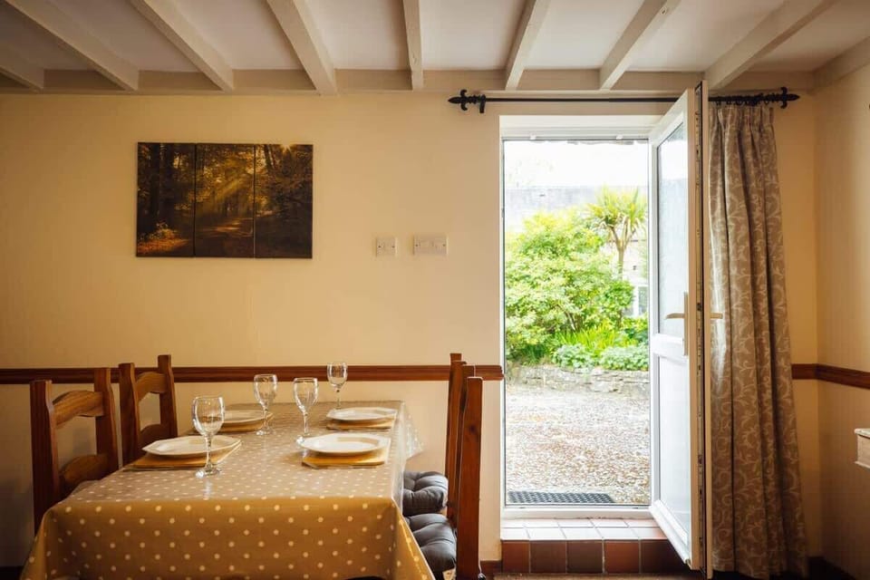 A bright and inviting dining area, perfect for enjoying home-cooked meals or sampling local Pembrokeshire treats.