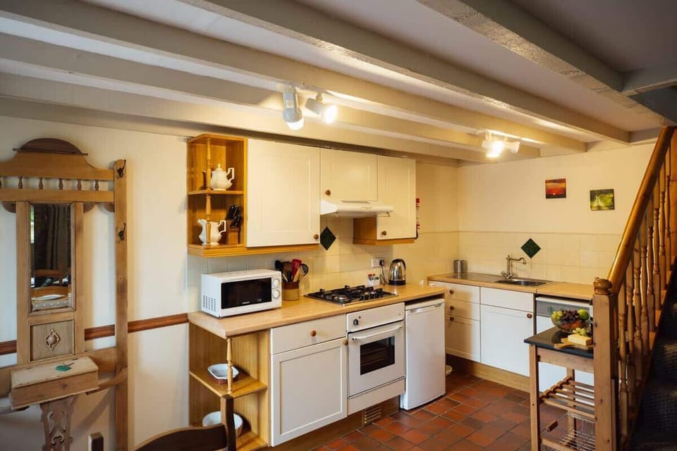A fully equipped kitchen ready for preparing meals, featuring all necessary appliances and a convenient layout for preparing family meals.