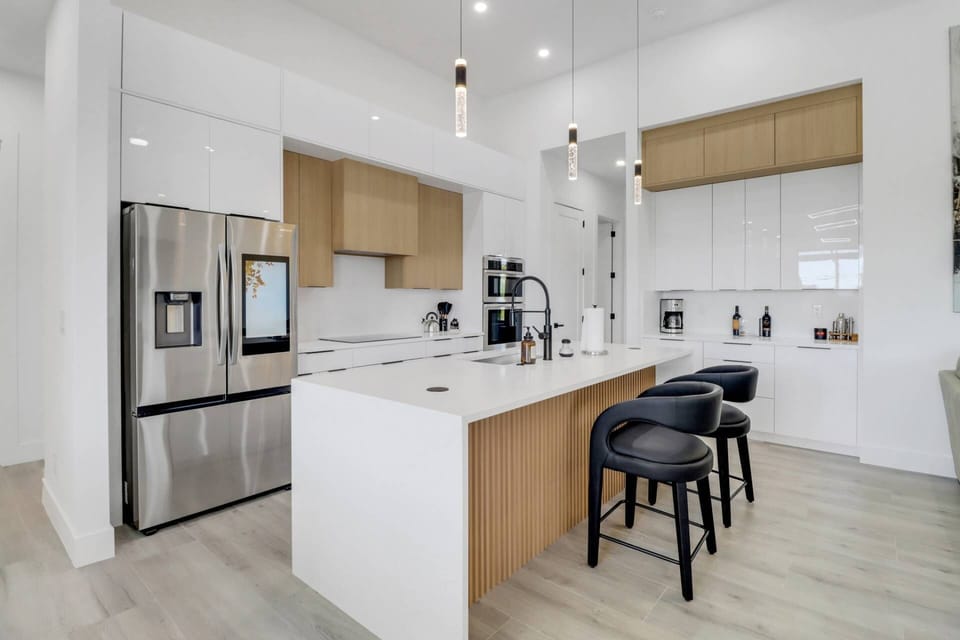 Open to the main living area, the kitchen is a visual delight! The cook will enjoy every minute spent preparing meals during your stay.