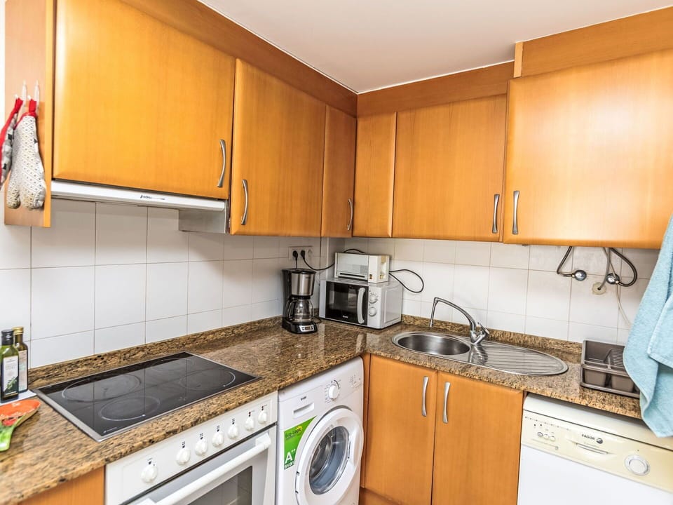 Cabinetry, Countertop, Property, Kitchen Sink, Sink, Tap, Kitchen Stove, Kitchen Appliance, Home Appliance, Kitchen