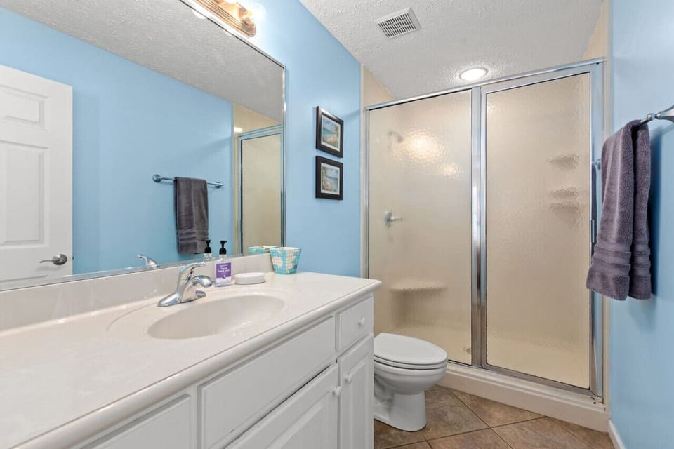 A luxurious en-suite bathroom attached to the king room, featuring all the space and amenities you need for a relaxing and private getaway!