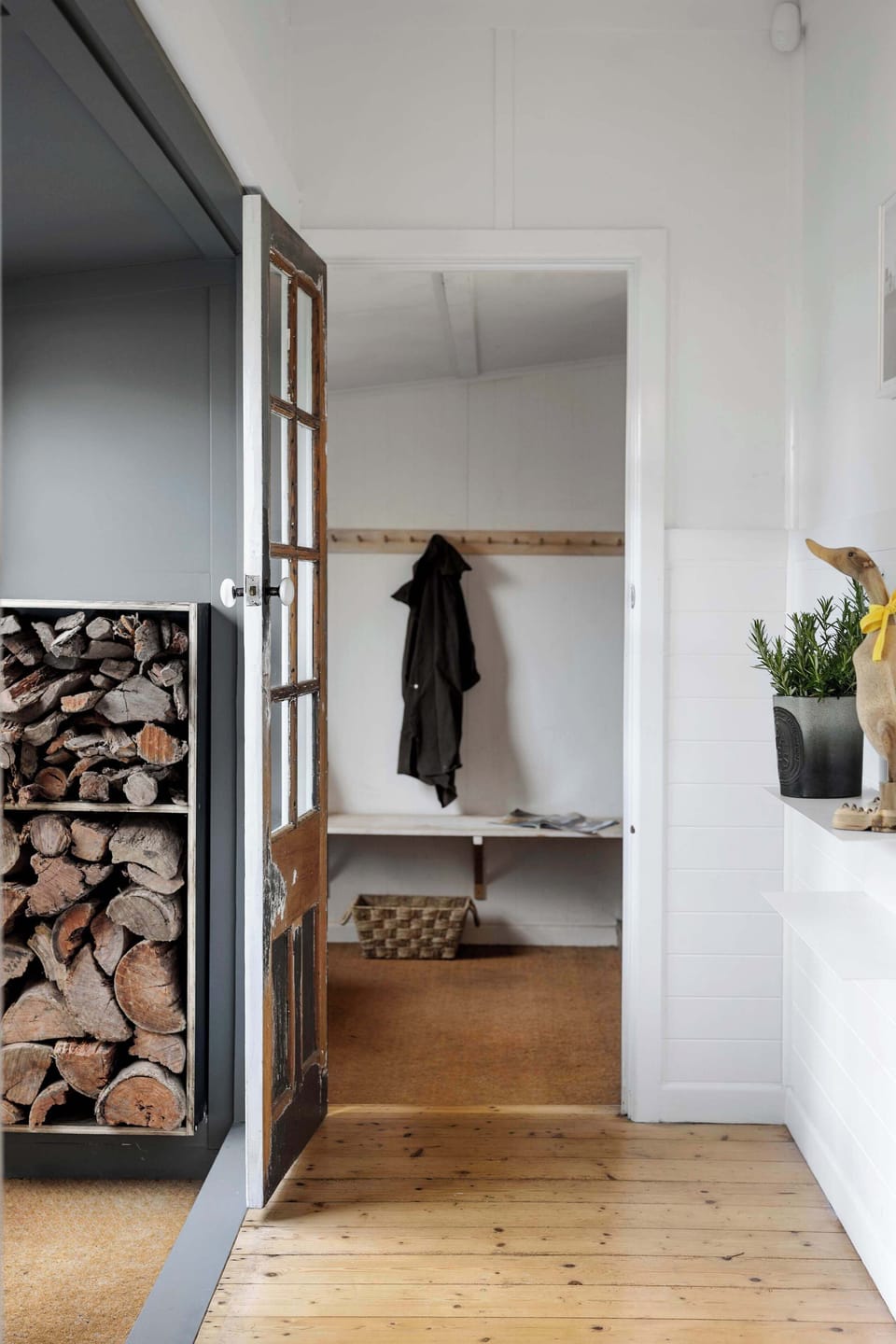 The mudroom and firewood storage
