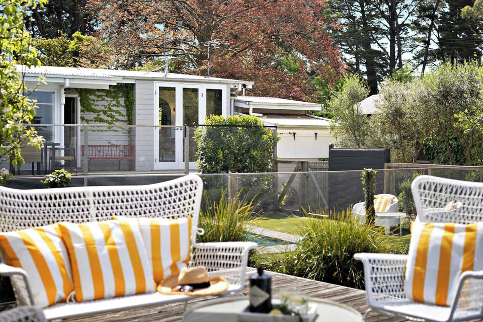 The second lounge deck overlooks the home, yard and studio. Perfect for an afternoon drink