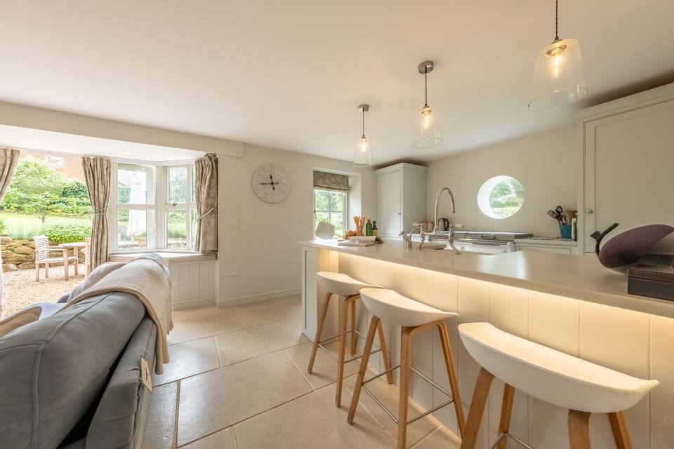 Ground floor: Modern kitchen with adjacent sitting room