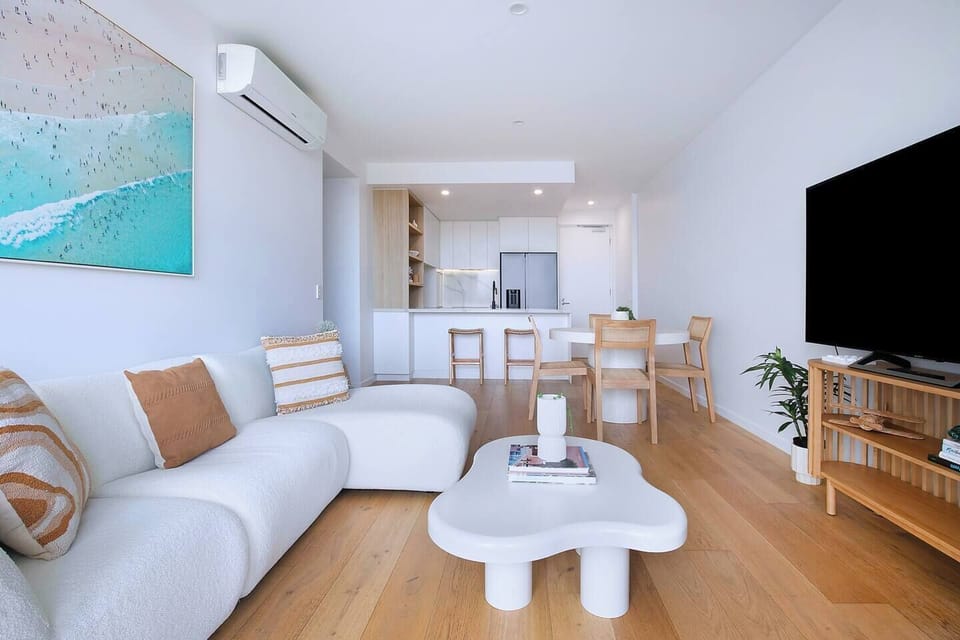 Settle in with some TV or relax with a book in the living area, which offers a cosy sofa and chaise for laidback afternoons in air-conditioned comfort. 