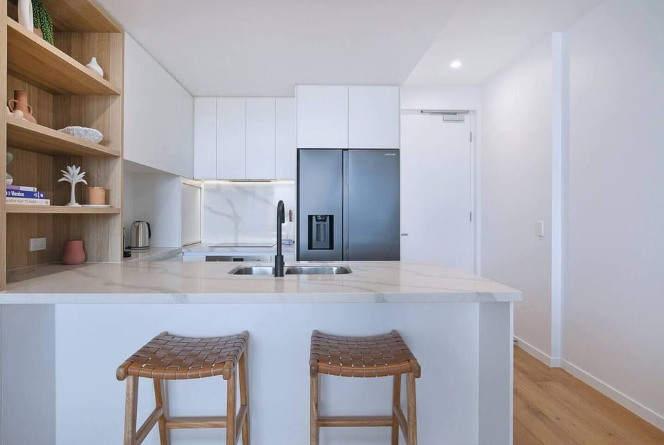 You’ll find all you need in the modern kitchen to prepare meals, plus a dishwasher for easy clean-up. 