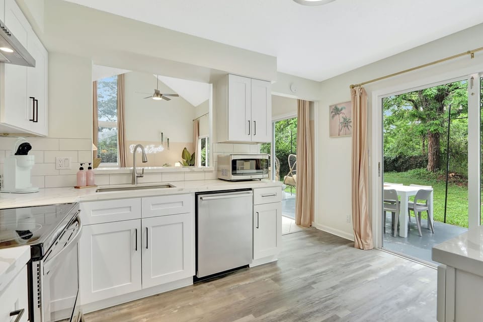 Kitchen with a pass-through to the dining area.