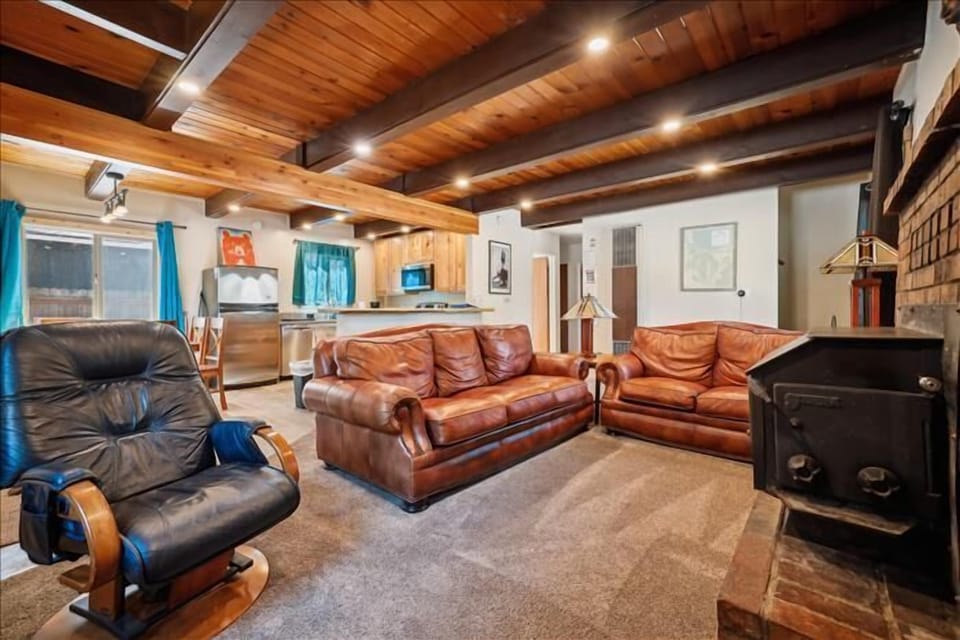 Cozy living room with comfortable seating, perfect for unwinding after a day of adventure.