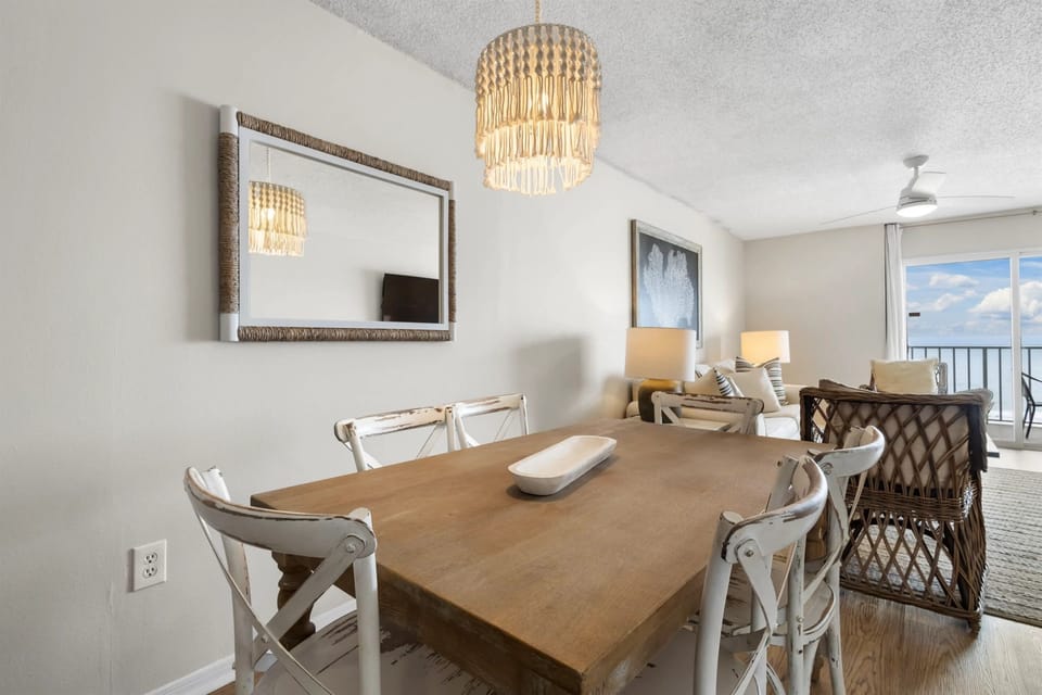 A stylish dining table with comfortable seating, perfect for enjoying meals with family and friends.