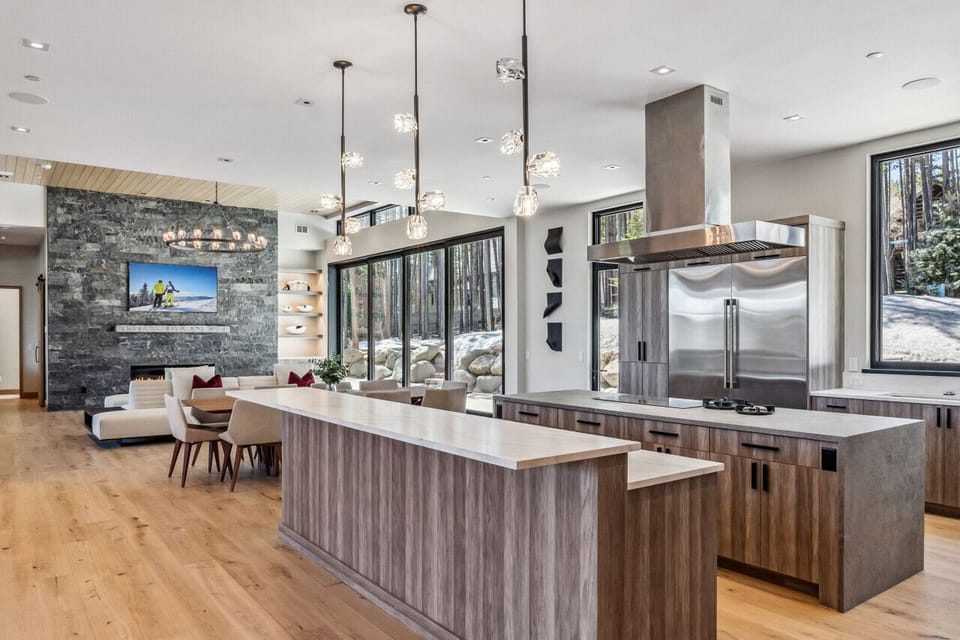 The kitchen is outfitted with Monogram appliances, and designed for superior performance