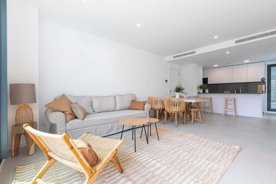 Bright and modern living room with an open dining area