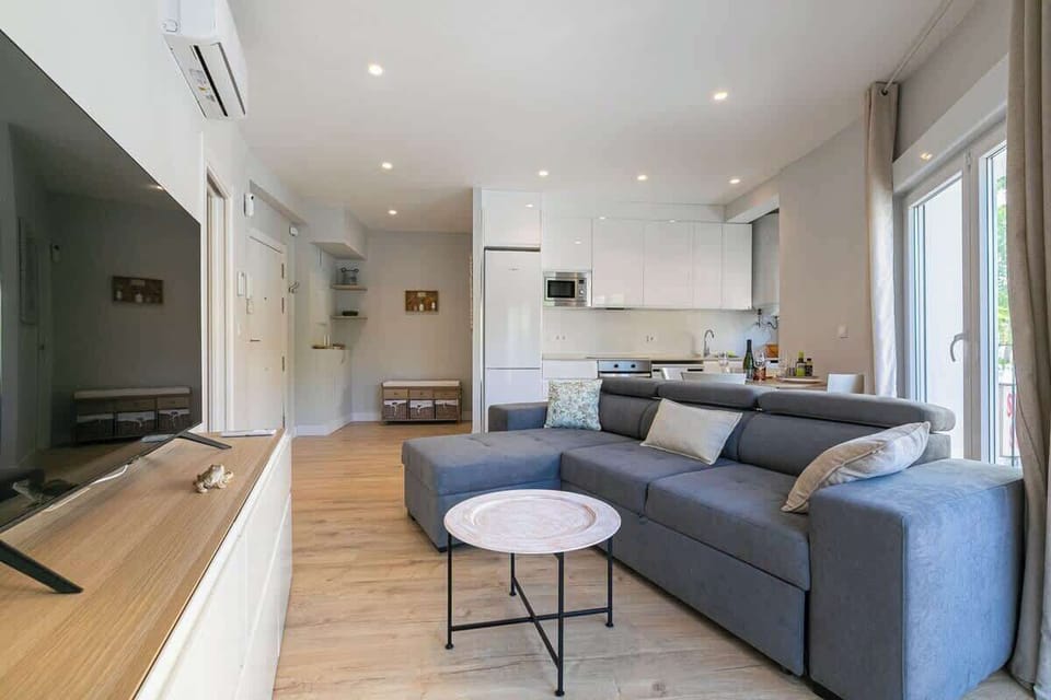 Spacious open living area with comfy sofa