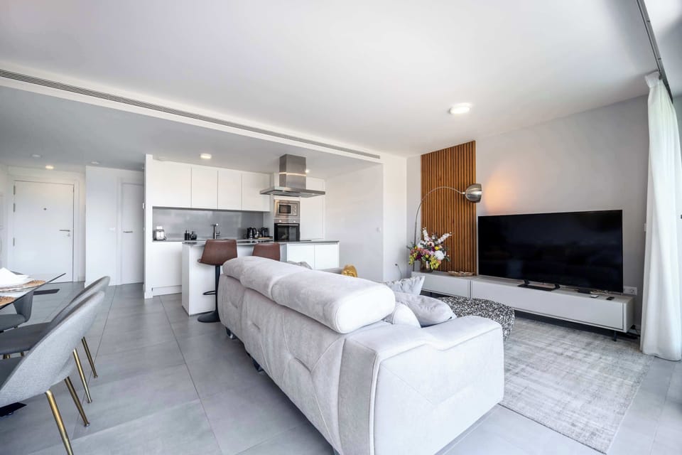 Inviting living room with comfortable seating, ideal for unwinding during your stay.