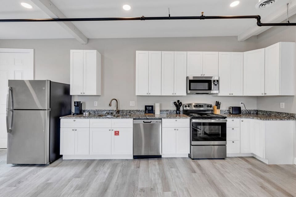 Chic Fully furnished Kitchen with Oven, Stove, Microwave, Refrigerator, Freezer, Keurig Coffee, in Biloxi, MS. A short drive from Gulfport, MS and Ocean Springs, MS
