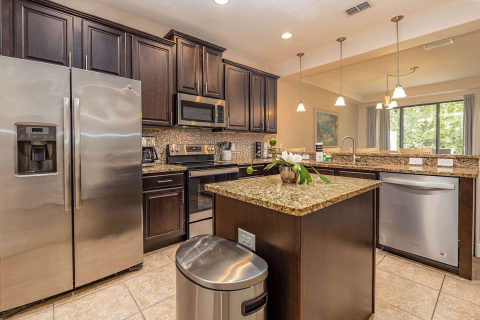 Fully equipped kitchen with quality appliances and a dishwasher for easy meal prep.