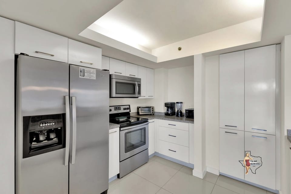 Enjoy cooking with ease in this fully equipped kitchen. 