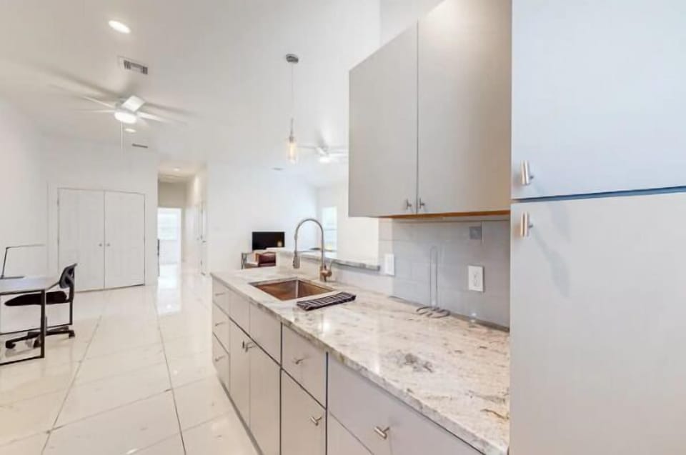 A blend of modern functionality and cozy charm, our kitchen is the heart of the home, inspiring creativity and culinary adventures every day.