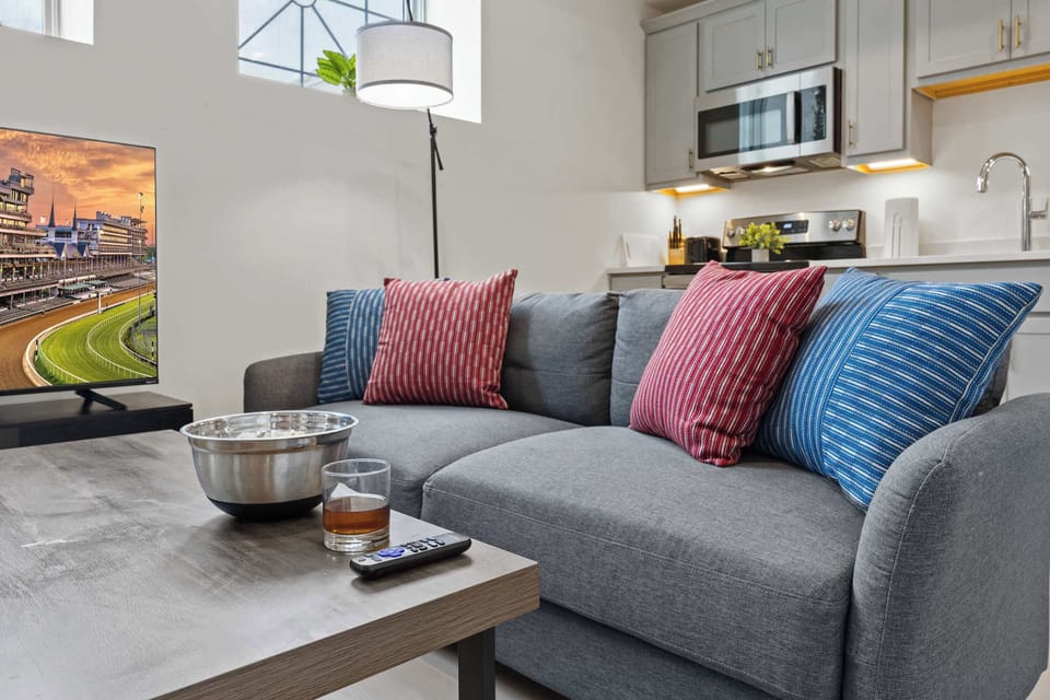 Living Room: Make yourself at home in the cozy living room with a comfy sofa and TV to unwind.