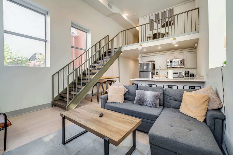 Make yourself at home in the cozy living room with a comfy sofa and TV to unwind.