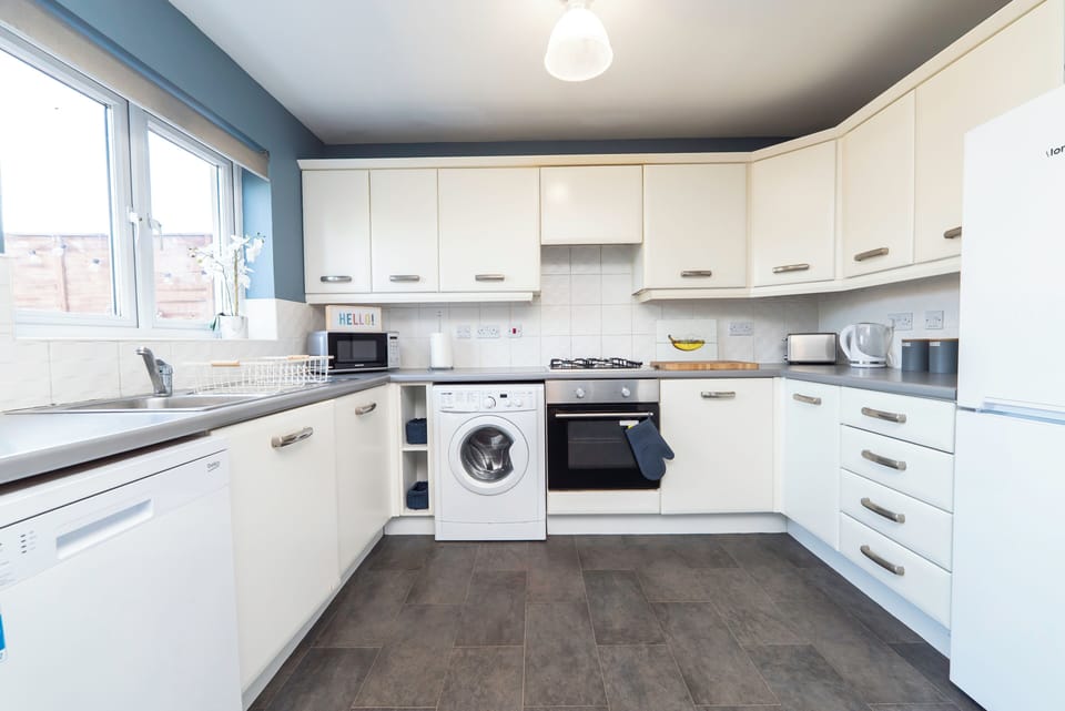 Kitchen with washing machine & dishwasher