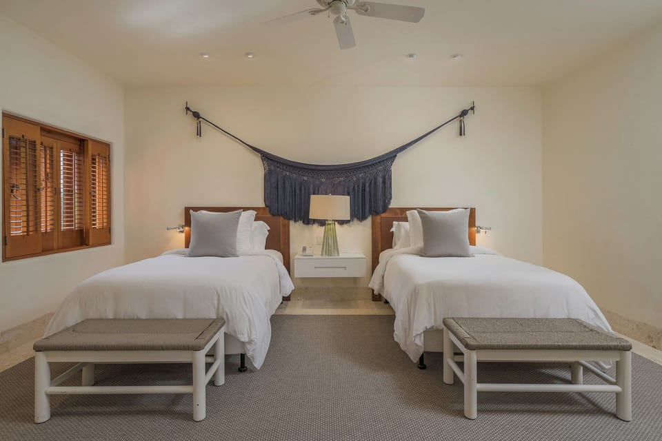 Cozy bedroom with twin beds ideal for children inside the gates of Punta Mita
