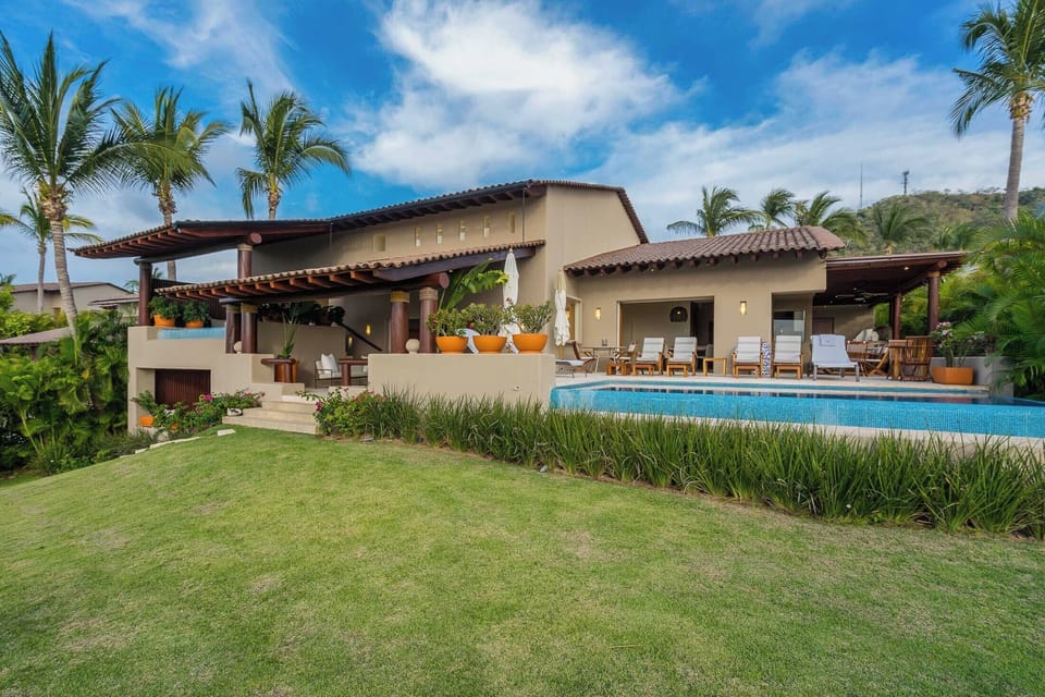 Access to Four Seasons Punta Mita spa, restaurants, and beach services
