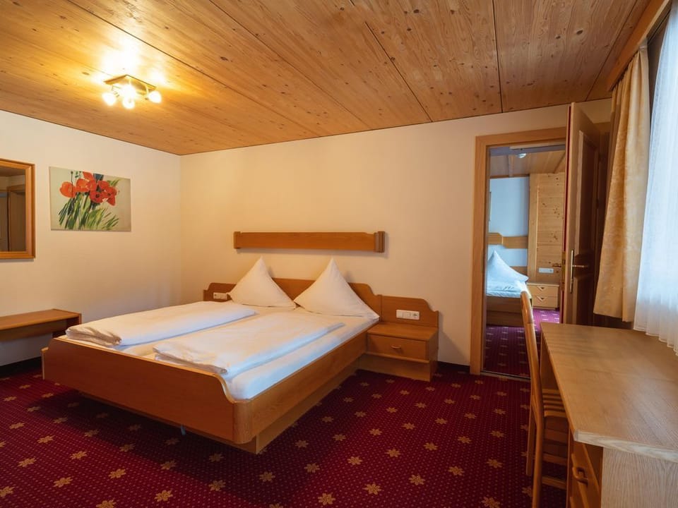 Large family room - Hotel Restaurant Alpenblume House in Fontanella