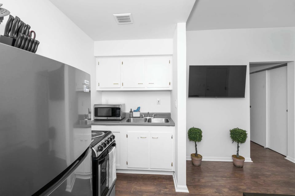Craft culinary delights in the efficient and well-equipped kitchen