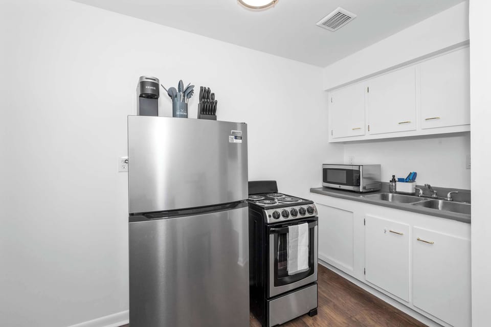 Craft culinary delights in the efficient and well-equipped kitchen