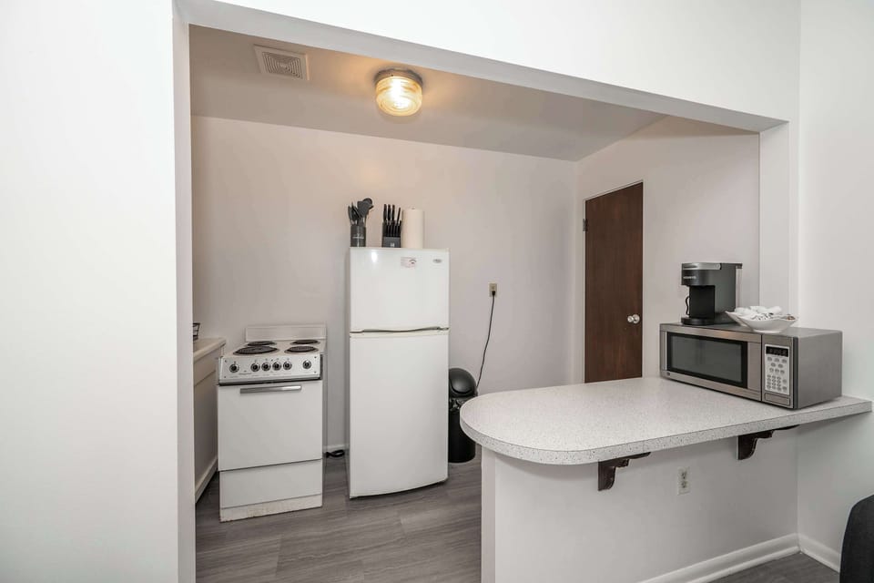 The efficient, open kitchen offers ample space & all the comforts of home